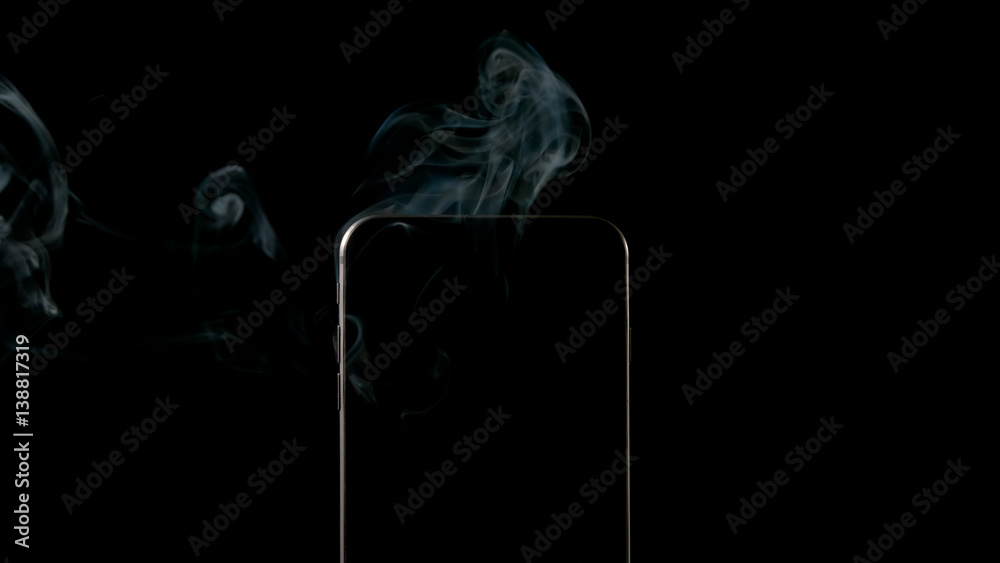 Smoke from smartphone on a black background - Center